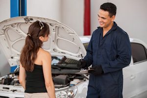 Woman with Mechanic - Meineke Chattanooga ASE Certification | Meineke Car Care | Chattanooga, TN